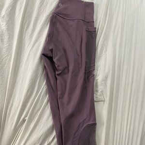 Cropped mesh Lululemon leggings with pockets on sides